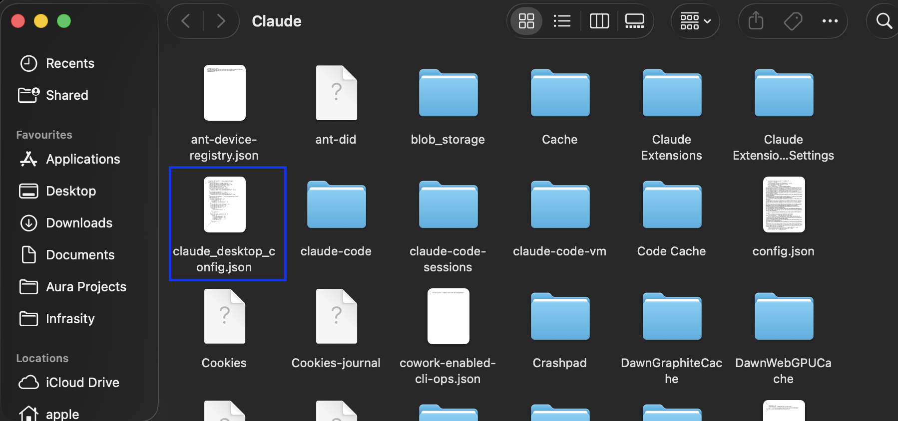 Finder window showing claude_desktop_config.json inside the Claude application support folder